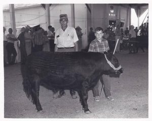 Harold Hartrich (left) at the 1969 Jasper Co. 4H auction.